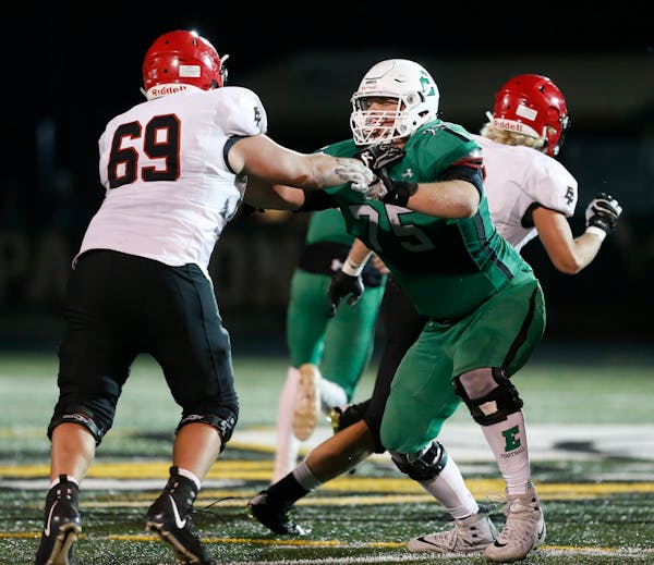 Quinn Carroll (75), a 6-6, 295-pound offensive tackle who is a junior at Edina and the top-ranked football recruit in Minnesota for the Class of 2019,