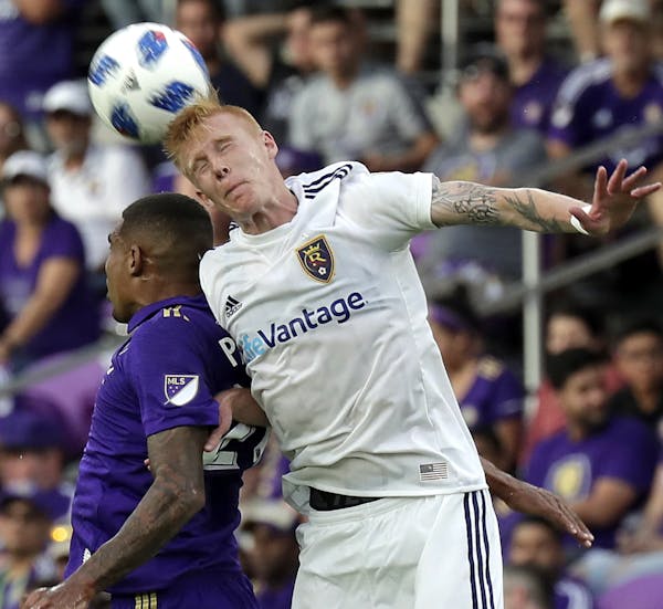 Orlando City’s Stefano Pinho, left, and Real Salt Lake’s Justen Glad clashed in a recent MLS match. Wisely, the league uses traditional rules agai