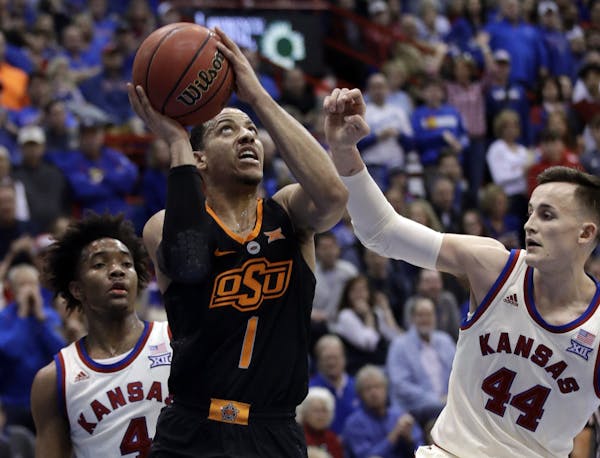 Kendall Smith and Oklahoma State upset No. 7 Kansas in Lawrence, Kan., last February.
