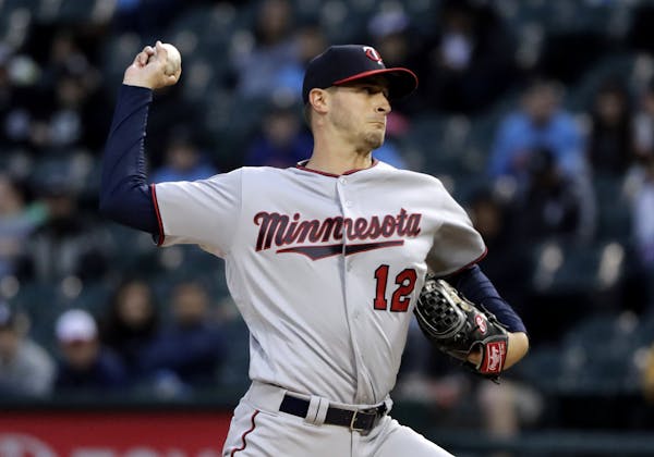Minnesota Twins starting pitcher Jake Odorizzi throws to a Chicago White Sox batter during the first inning of a baseball game Thursday, May 3, 2018, 