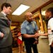 Minneapolis Mayor Jacob Frey watched as Minneapolis Police Chief Medaria Arradondo shook hands with 10-year old Jayden Goldsboro before the unveiling 
