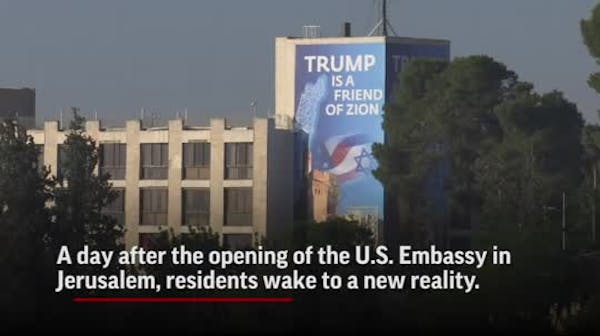 Day after U.S. Embassy opens: Funerals, protests