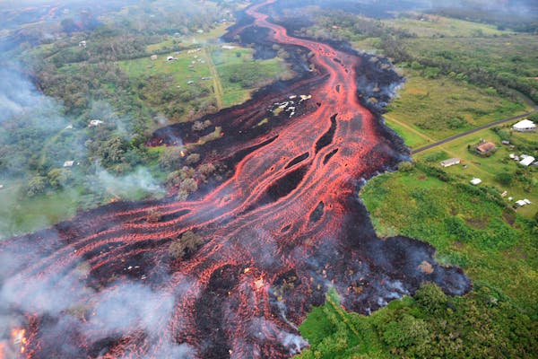 Lava flows from fissures near Pahoa, Hawaii. Kilauea volcano began erupting more than two weeks ago and has burned dozens of homes.