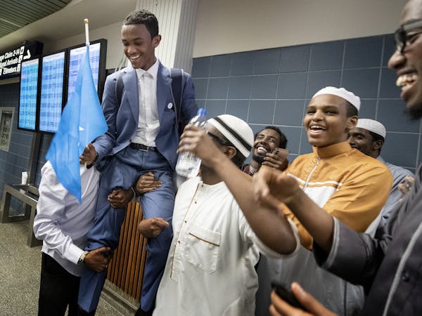 Ahmed Burhan Mohamed was greeted Wednesday at the Minneapolis-St. Paul International Airport after winning the Dubai International Holy Qur'an Award i