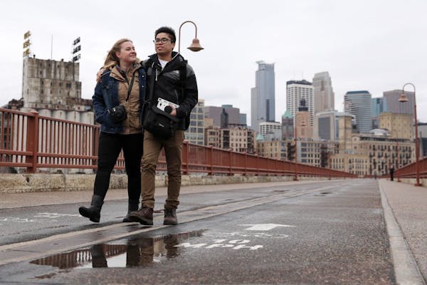 Ellie Drews and her boyfriend Clarence Insixiengmay walked down the Stone Arch Bridge last month. The Stone Arch Bridge may close this summer if state