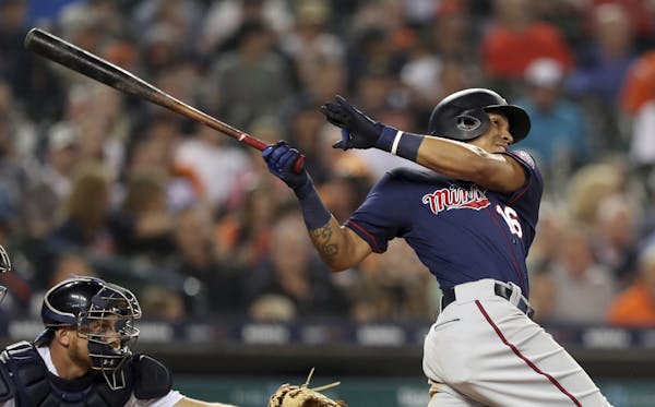 Ehire Adrianza belted a grand slam in the seventh inning, giving the Twins a 5-2 lead over the Tigers in Detroit.