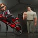 This image released by Disney Pixar shows the character Helen/Elastigirl, voiced by Holly Hunter, left, and Bob/Mr. Incredible, voiced by Craig T. Nel