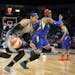 Maya Moore drove to the basket next to the Dallas Wings' Kayla Thornton on Tuesday.