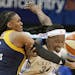 Former Indiana Fever forward Erlana Larkins, left, is expected to sign with the Lynx. (AP Photo/Jim Mone)