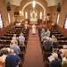 Pastor Sarah Taylor led a recent Sunday service at La Salle Lutheran Church in La Salle, Minn. The church will close in August, joining a trend descri