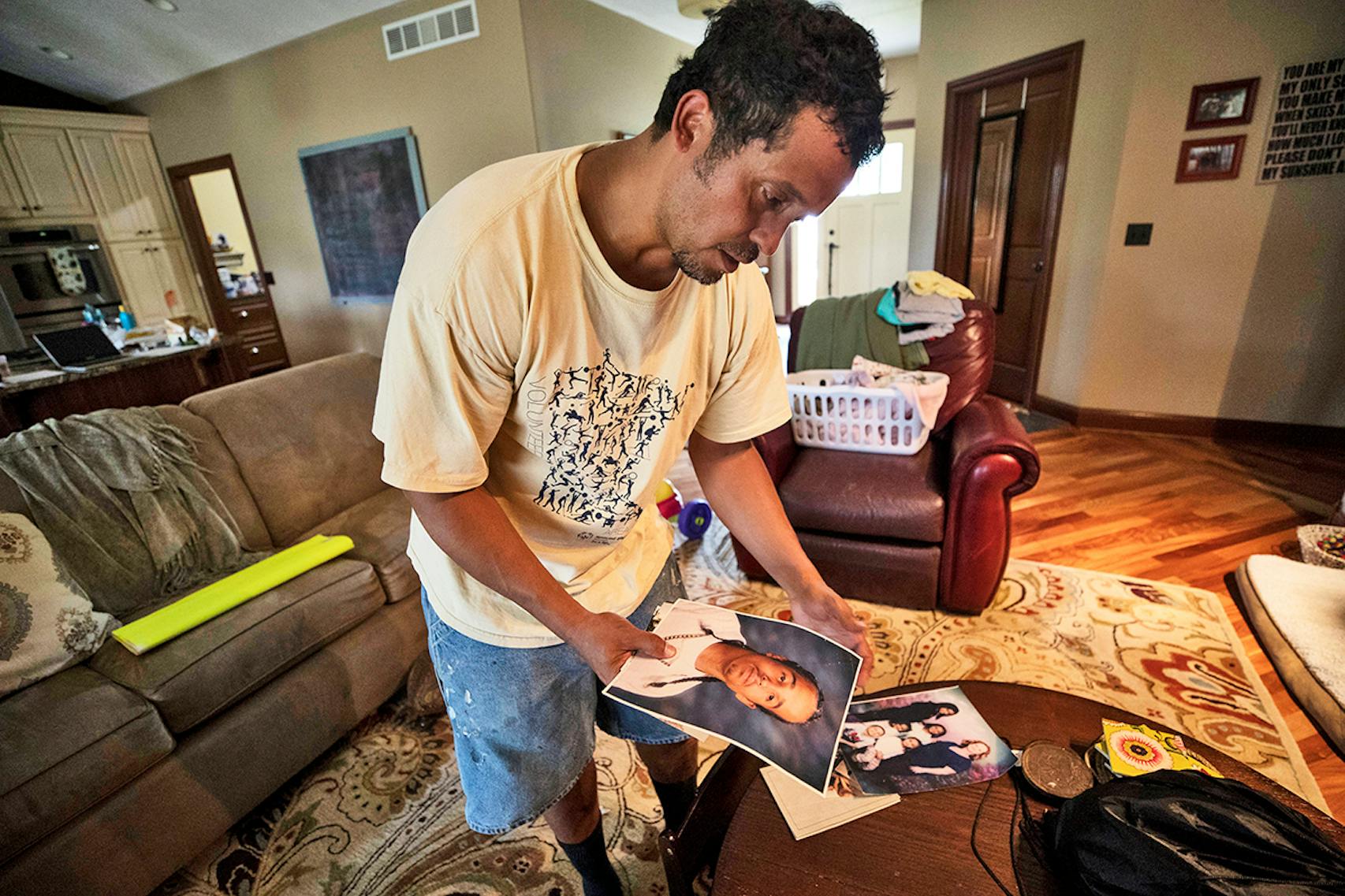 Willie Finley's brother Tremaine was shot and killed 14 years ago in south Minneapolis. On recent Sunday, he spent time looking at photos of his brother.
