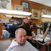 “[Trump]’s got a mouth that runs, but he gets things done,” Jim Fisher said as he got a haircut at Cowboy Mel's Barber Shop in Anoka.