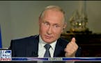 Putin again denies interference in U.S. election