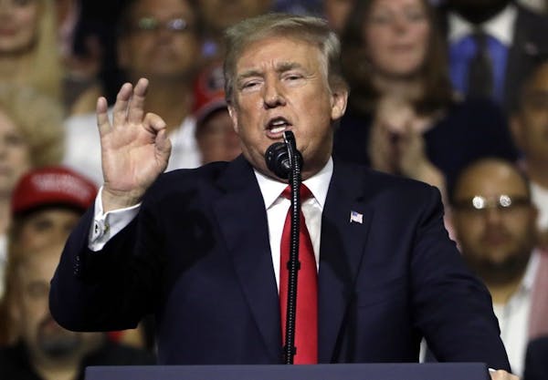 President Donald Trump gestures during a rally Tuesday, July 31, 2018, in Tampa, Fla.