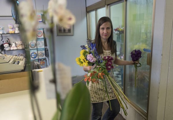 Ashley Weed, owner of Jandrich Floral Shop in St. Paul, isn't sold on the idea of a W. 7th streetcar.