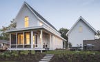 Sara and Jeremy Imhoff’s new home is a twist on tradition with a classic gable and porch on the outside and a clean modern aesthetic on the inside. 