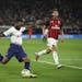 Tottenham's Georges-Kevin Nkoudou took a second-half shot on goal. At right was A.C. Milan midfielder Manuel Locatelli (73). Nkoudou scored the only g