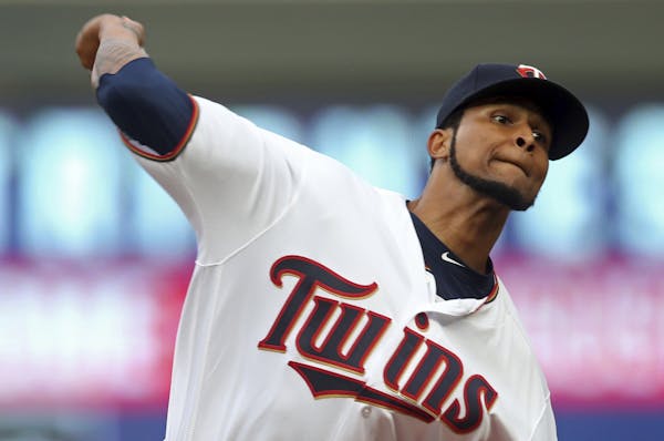 Minnesota Twins pitcher Ervin Santana throws to a Detroit Tigers batter during the first inning of a baseball game Thursday, Aug. 16, 2018, in Minneap