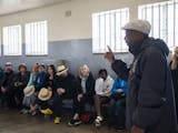 Tour guide and former political prisoner Derrick Basson leads a tour of the former prison on Robben Island.