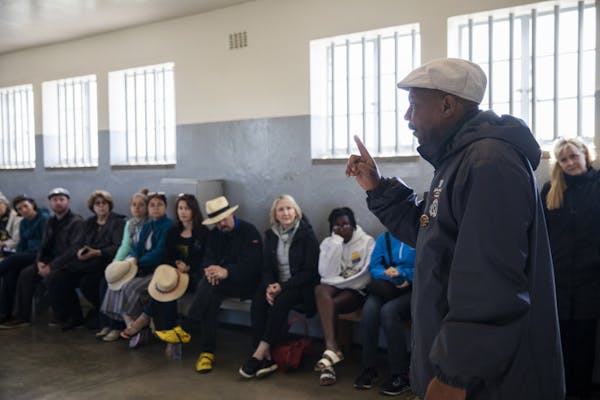 Tour guide and former political prisoner Derrick Basson leads a tour of the former prison on Robben Island.