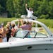 Tom Palm also known as the Tonka Paparazza spends hours on Lake Minnetonka, telephoto in hand, photographing folks on their pontoons, speedboats and J