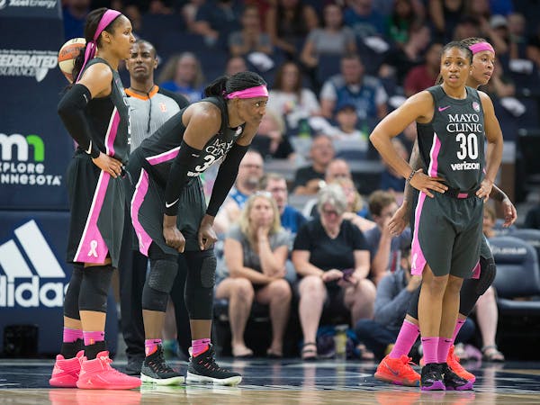 From left, the Lynx's Maya Moore, Sylvia Fowles, Tanisha Wright and Seimone Augustus showed their frustration during the fourth quarter as the Lynx lo