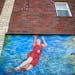Lindsay Whalen is part of a mural painted on the side of Security Coin & Pawn Shop in downtown Hutchinson, where she grew up.