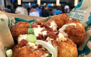 Bacon-Stuffed Tots, Blue Barn, West End Market, $8.95. More like croquettes than Tots (which is a good thing) and the bacon is great. The bacon fat in
