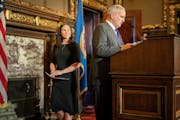 Minnesota Gov. Mark Dayton and Education Commissioner Brenda Cassellius. More than 480 struggling Minnesota schools are set to get additional help fro