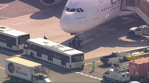 Plane lands at JFK with dozens of sick passengers