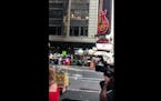 Bees swarm Times Square hot dog stand