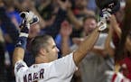 Minnesota Twins Joe Mauer came out for a curtain call after hitting a grand slam home run in the fifth inning. ] CARLOS GONZALEZ ï cgonzalez@startrib