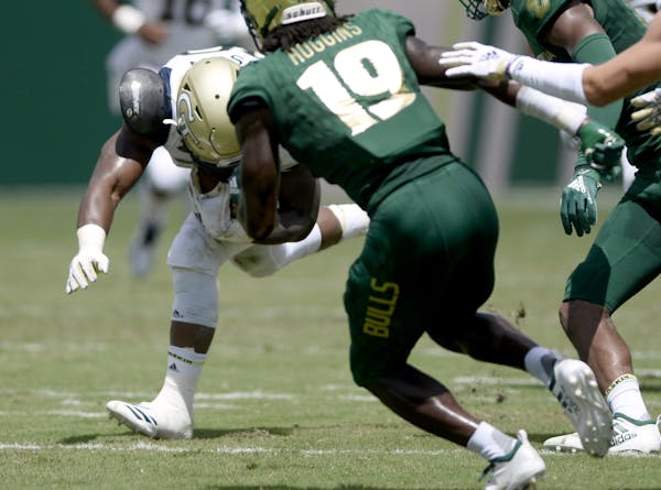 Georgia Tech running back KirVonte Benson was injured on this play against South Florida last Saturday.
