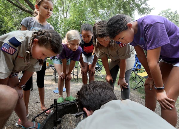 Members of Edina cub scout pack 168 are among the first girls in the country to be scouts -- and they are holding their first campout, at Lake Auburn 