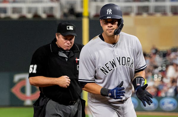Gary Sanchez crossed home plate after hitting a home run in the sixth inning for the Yankees at Target Field.