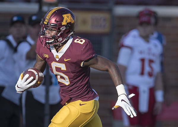 Minnesota's wide receiver Tyler Johnson ran with the ball for a first down during the fourth quarter as Minnesota took on Miami (Ohio), Saturday, Sept