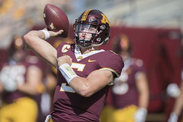 Quarterback Zack Annexstad suffered an ankle injury early Saturday but went on to throw 20 passes and help lead the Gophers to victory.