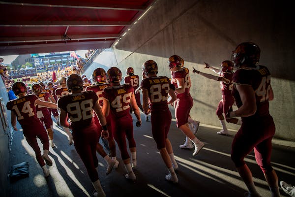 The Gophers made their way out onto the field through the tunnel before they took on Fresno State at TCF Bank Stadium on Saturday