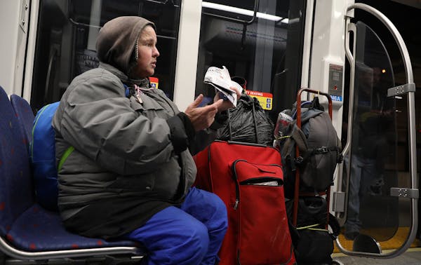 A homeless woman who identified herself only as Rita talks about spending nights on the Metro Transit light-rail trains to keep out of the cold in Min