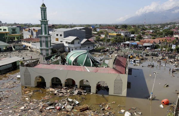 Rescuers reach Indonesian city hard-hit by quake