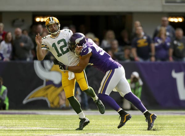 Green Bay Packers quarterback Aaron Rodgers left last year’s game against the Vikings after a hit from outside linebacker Anthony Barr.