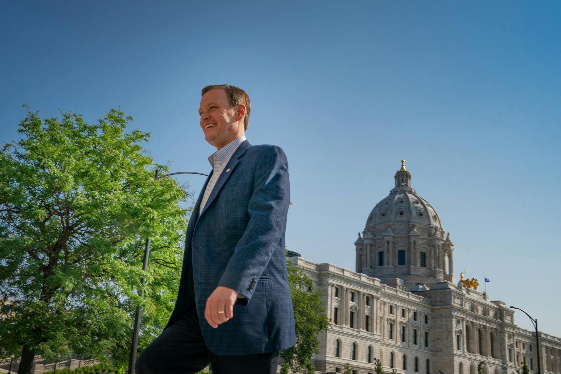 Jeff Johnson climbed the steps of the State Office Building, heading for a press conference after winning his primary election contest against Tim Pawlenty.