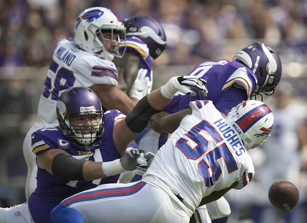 Jerry Hughes (55) sacked Vikings quarterback Kirk Cousins on Sunday, forcing one of the two fumbles he lost in the first quarter.