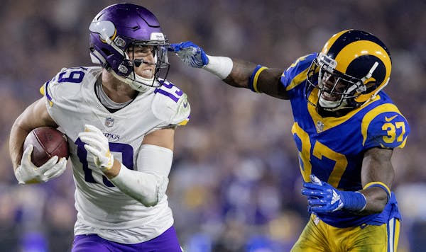 Adam Thielen (19) had 135 receiving yards Thursday night against the Rams and has started the season with four consecutive 100-yard games.