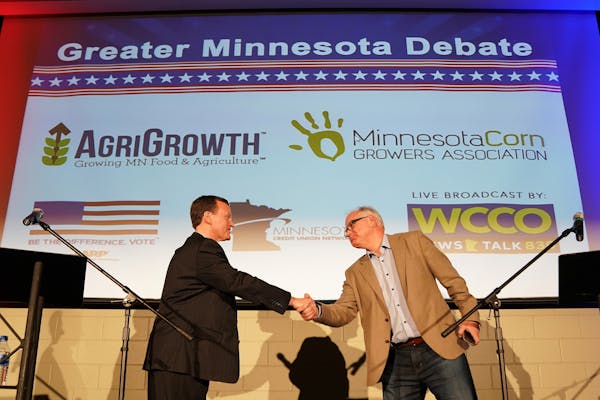 Minnesota gubernatorial candidates Republican Jeff Johnson, left, shook hands with with DFLer Tim Walz after the "Greater Minnesota Debate" in Willmar
