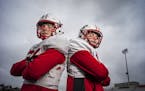 Senior defensive linemen Will Mostaert (left) and twin brother Eli are key members of the Lakeville North defense. Photo: Richard Tsong-Taatarii * Ric