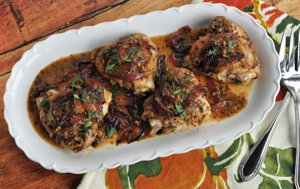 Cider-Mustard Braised Chicken Thighs With Apples and Onions.