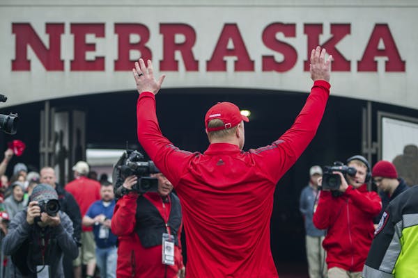 Nebraska head coach Scott Frost waved to fans while walking off the field after the Red/White football game in Lincoln, Neb., on April 21.