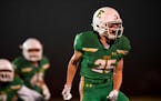 Edina defensive back Russell Spence celebrated his team's second fumble recovery of the game Friday night against Minnetonka.