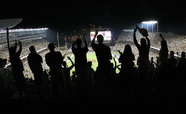 Night games at TCF Bank Stadium are nothing new for the Gophers; their first game at the stadium, above, was under the lights against Air Force in Sep